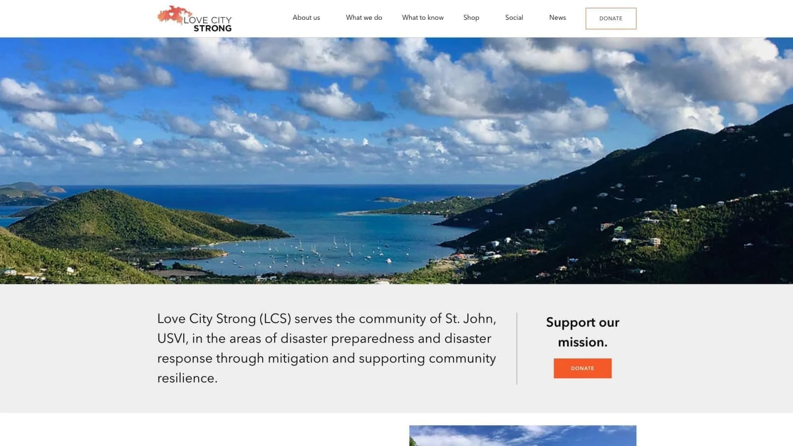 Love City Strong home page with a panoramic photo of green hills around a bay full of sailboats on St. John, U.S. Virgin Islands, above the group’s disaster preparedness mission statement and a Donate button.